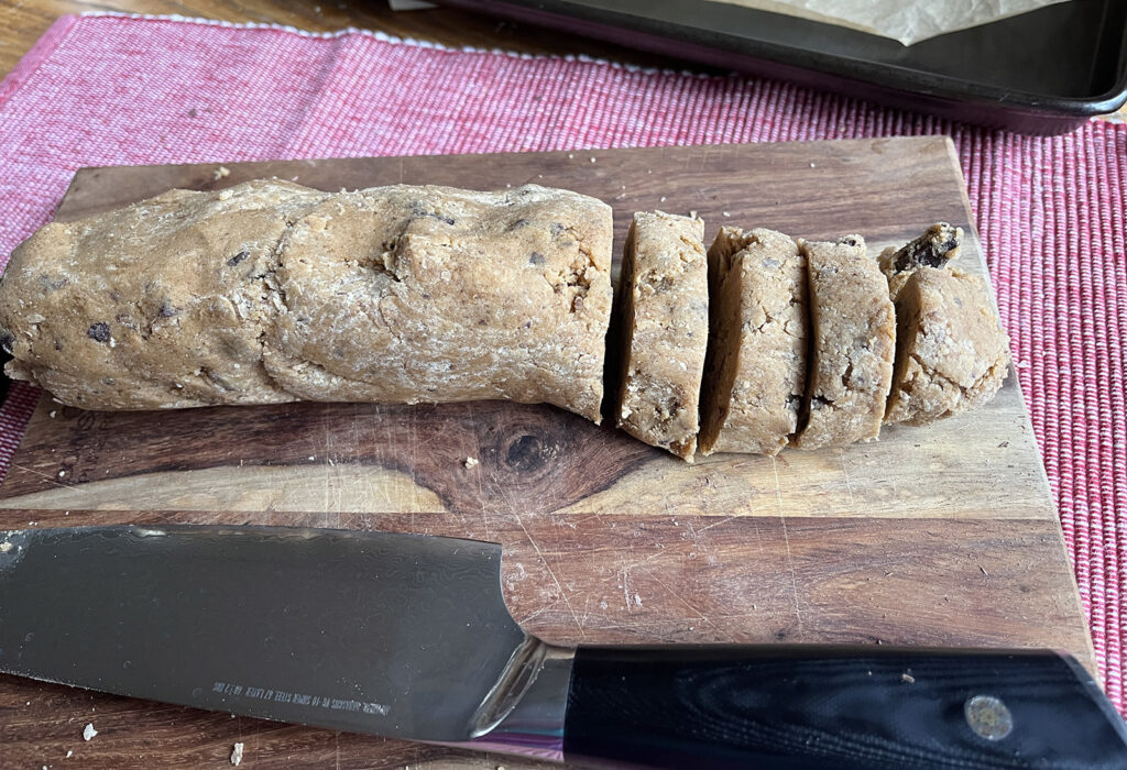 I roll the cookie dough into a log, so that I can cut 12 equal pieces from it