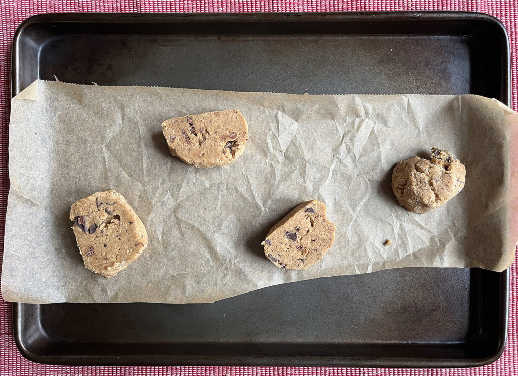 Place the required number of cookies on a lined baking tray