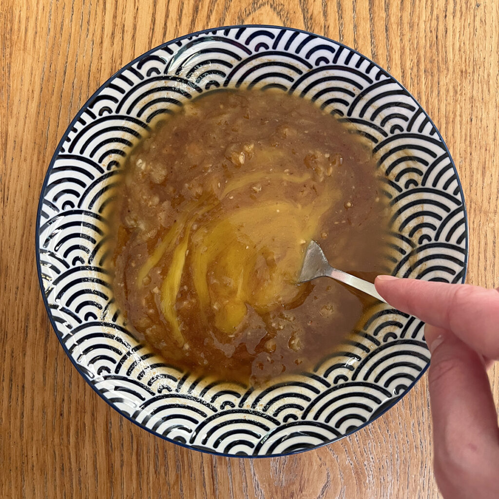 Mix through the egg yolk in the banana oatmeal cookies batter